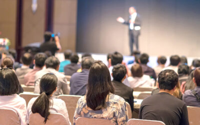 rear-side-of-audiences-sitting-and-listening-the-speackers-on-the-stage-1-400x250-
